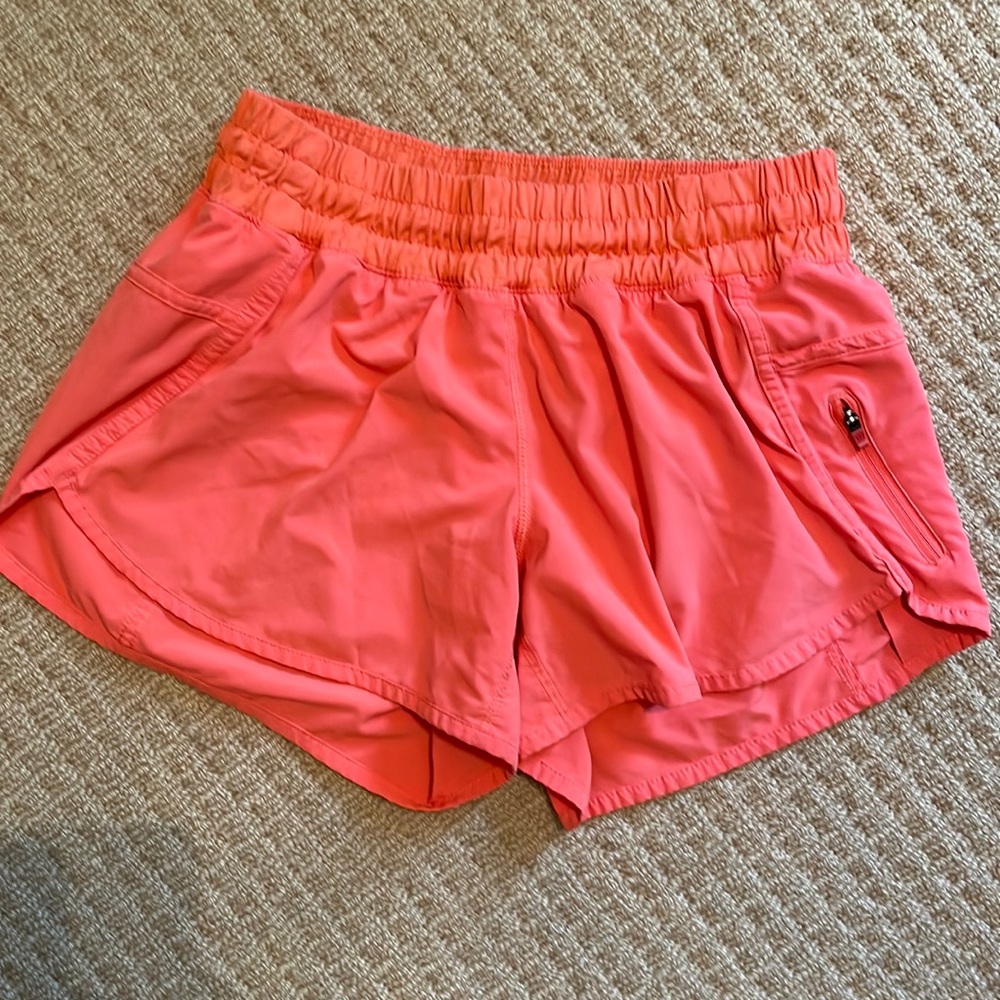 Lululemon orange tracker shorts